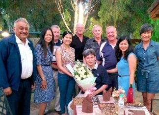 Mai (seated centre) poses for a photo with Peter Malhotra (PSC President), Joe Mooneyham (PSC Vice President), George Bennison (Club Secretary), Geoff Crouch (Registrar), Jim Bryan (Treasurer), Noi Emmerson (Charity Chairperson) and PSC office colleagues Somkhit Charoenphon (Khit) , Nantida Thepsai (Lucky) and Shonasan Lomachaem (Nam) at the Courtyard Restaurant.